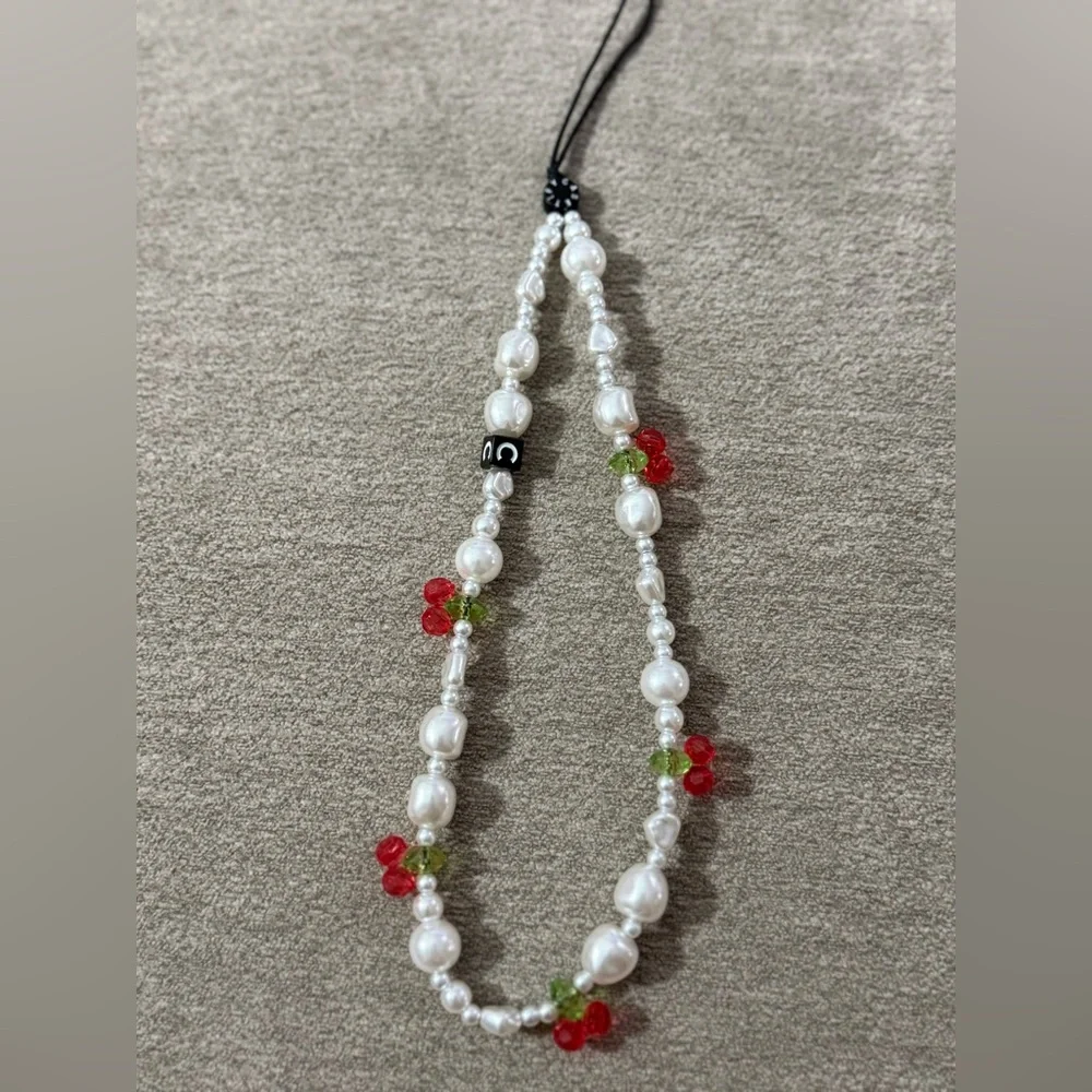 Casetify Fruit phone charm cherry.